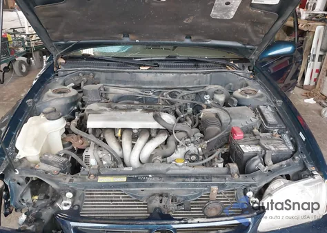 1999 Toyota Corolla Le z USA, uszkodzony, nr VIN 1NXBR18EXXZ169977